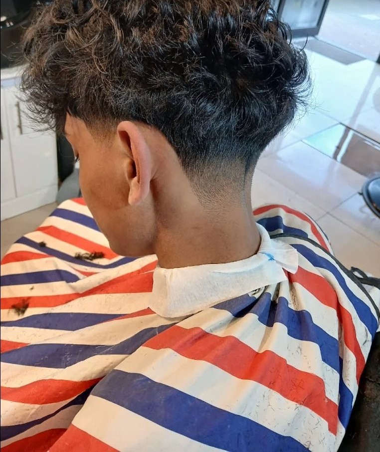Curly fade back